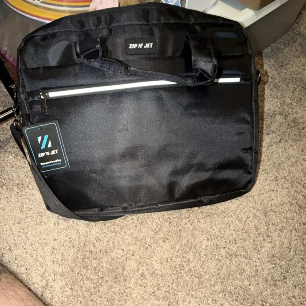 ZIP N' JET Waterproof Black Laptop Bag for Men, new with tags